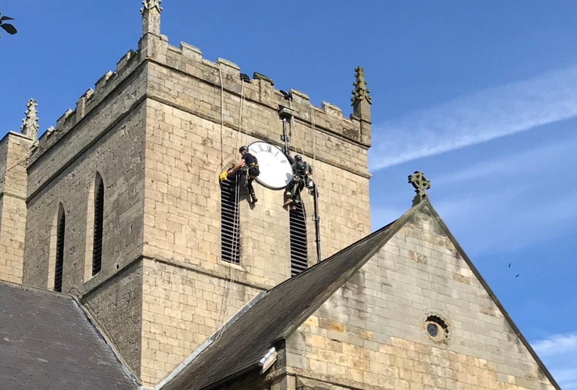 Two Brave Men Painting The Clockface - 2025